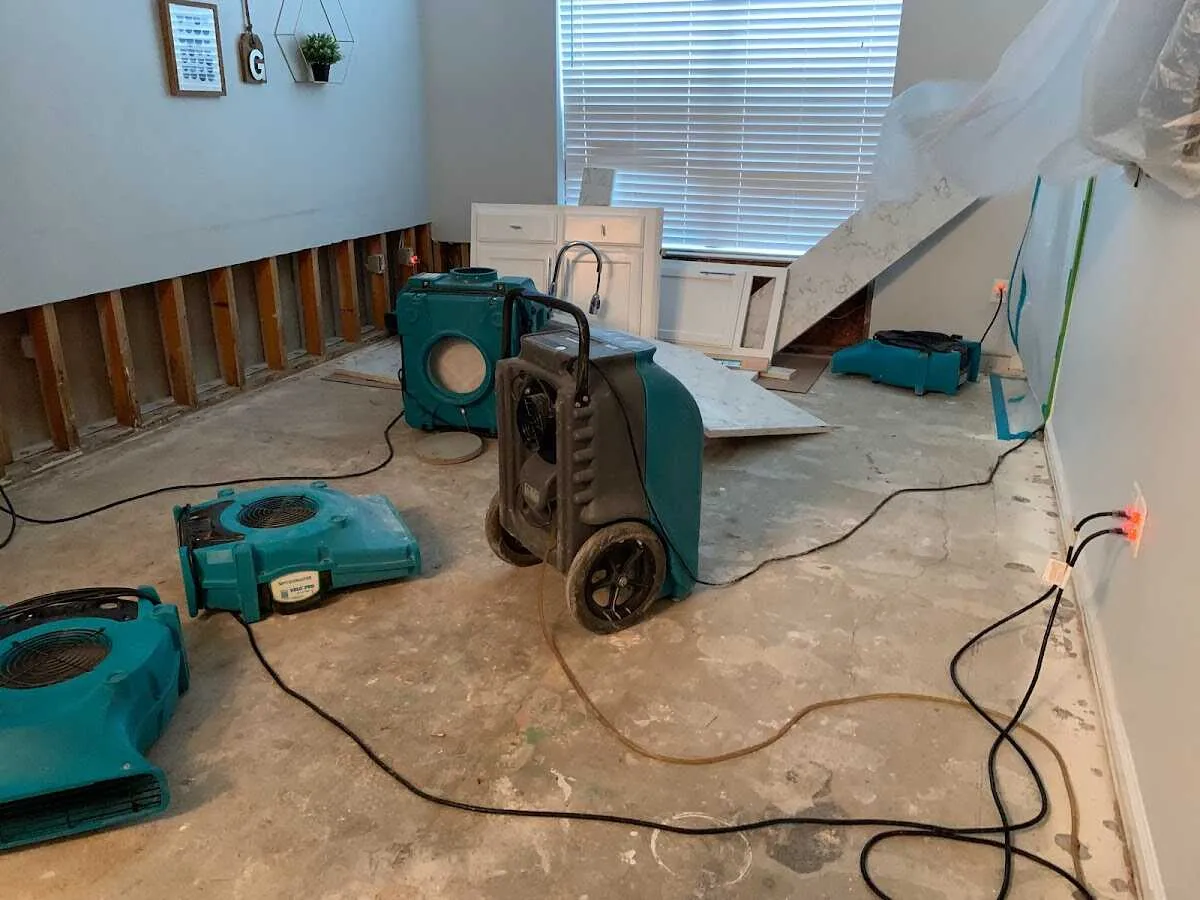 Dehumidifier in flood-cut room for Water Damage Restoration in Winter Park